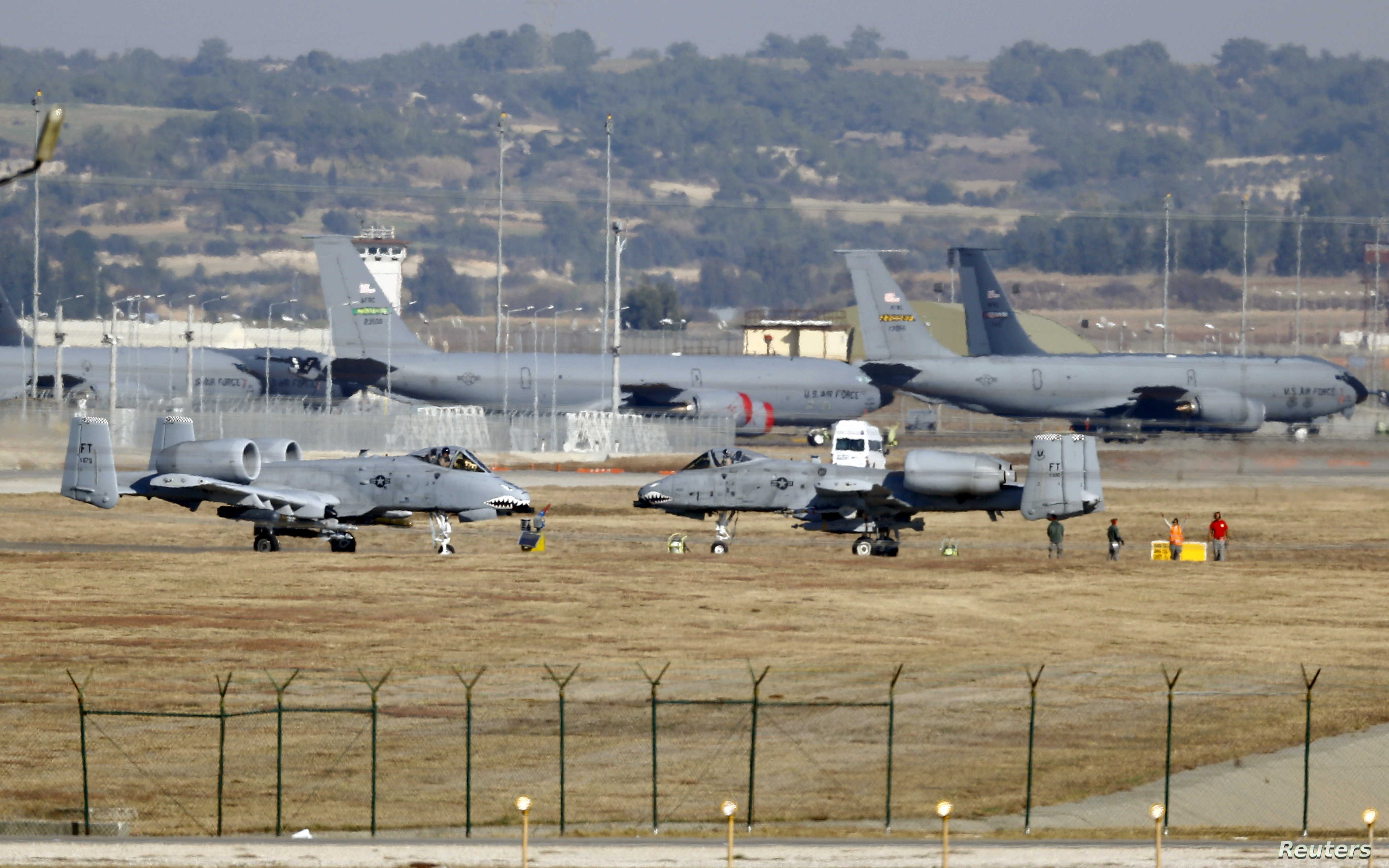 U.S. Air Force A-10 Thunderbolt II fighter jets (foreground) are pictured at Incirlik airbase in the southern city of Adana, Turkey, in this December 11, 2015 file photo. REUTERS/Umit Bektas/Files - GF10000364314