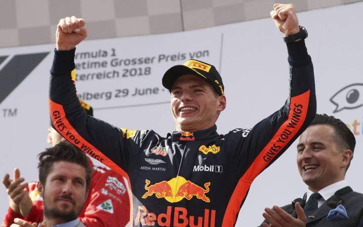 Red Bull driver Max Verstappen of the Netherlands celebrates on the podium after winning the Austrian Formula One Grand Prix at the Red Bull Ring racetrack in Spielberg, southern Austria, Sunday July 1, 2018. (AP Photo/Ronald Zak)