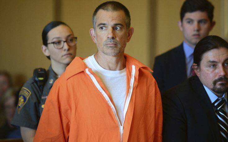 Fotis Dulos stands during a hearing at Stamford Superior Court, Tuesday, June 11, 2019 in Stamford, Conn. Fotis Dulos, and his girlfriend, Michelle Troconis, have been charged with evidence tampering and hindering prosecution in the disappearance of his wife Jennifer Dulos. The mother of five has has been missing since May 24. (Erik Trautmann/Hearst Connecticut Media via AP, Pool)