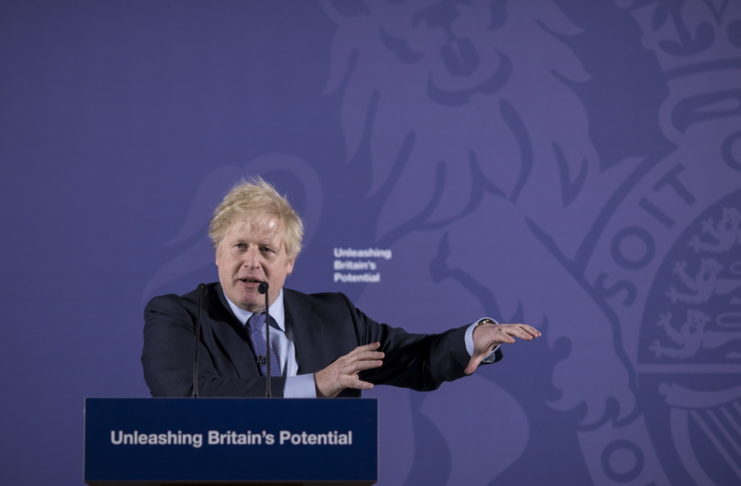 epa08190338 British Prime Minister Boris Johnson gestures as he delivers a speech on 'Unleashing Britain's Potential' at the Old Royal Naval College in London, Britain, 03 February 2020.  The United Kingdom officially left the EU on 31 January 2020, beginning an eleven month transition period with negotiations over a future trade deal.  EPA/Jason Alden / POOL