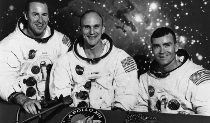 The Apollo 13 astronauts, from left: James A. Lovell Jr., commander; Thomas K. Mattingly II, command module pilot; and Fred W. Haise Jr., lunar module pilot, is a special transmission for the Washington Post shown April 4, 1970. (AP Photo)