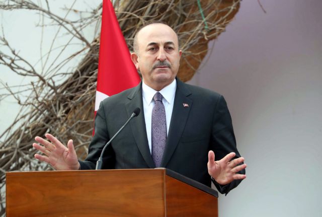 epa07319121 Turkish Foreign Minister Mevlut Cavusoglu speaks at a joint press conference with President of Northern Cyprus Mustafa Akinci (not seen) in the Turkish Cypriot northern part of the divided city of Nicosia, Cyprus, 25 January 2019.  EPA/ANDREAS MANOLI