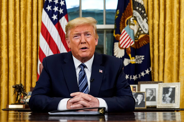 U.S. President Donald Trump speaks about the U.S response to the COVID-19 coronavirus pandemic during an address to the nation from the Oval Office of the White House in Washington, U.S., March 11, 2020. Doug Mills/Pool via REUTERS