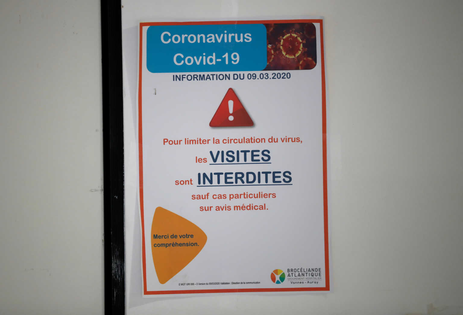 A no-access sign is seen on the door leading to the pulmonology unit at the hospital in Vannes where patients suffering from coronavirus disease (COVID-19) are treated, France, March 20, 2020. REUTERS/Stephane Mahe