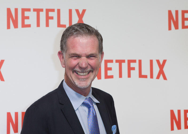 Netflix CEO Reed Hastings arrives for the 'Netflix' Launch Party in Paris, Monday Sept. 15, 2014. (AP Photo/Jacques Brinon)