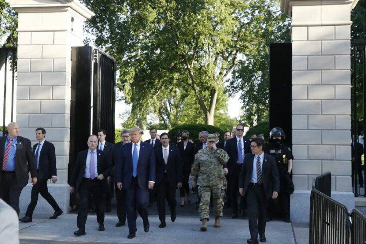 President Donald Trump walks from the gates of the White House to visit St. John's Church across Lafayette Park Monday, June 1, 2020, in Washington. (AP Photo/Patrick Semansky)