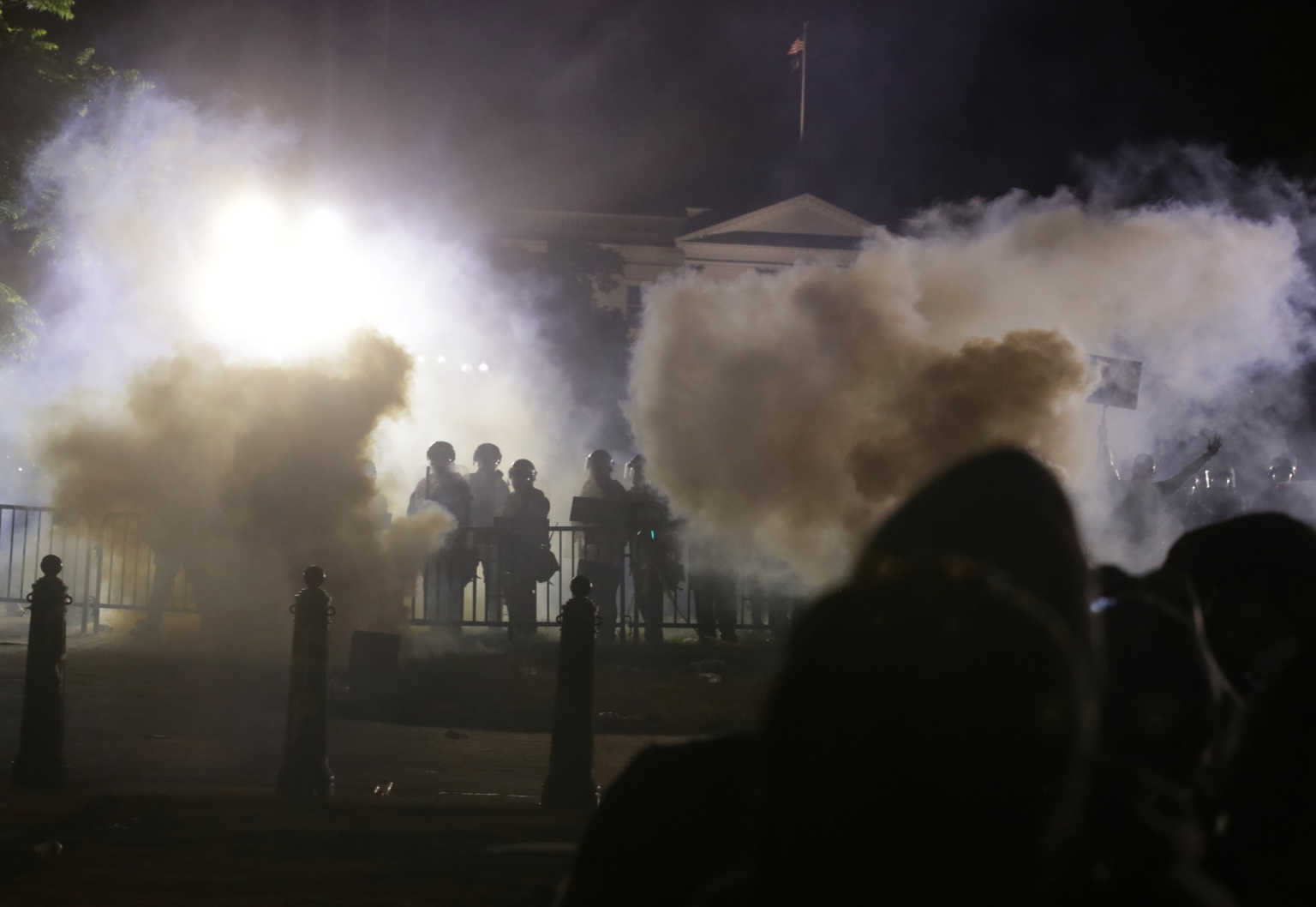 Law enforcement personnel clash with protesters rallying at the White House against the death in Minneapolis police custody of George Floyd, in Washington, D.C., U.S. May 31, 2020.  REUTERS/Jonathan Ernst