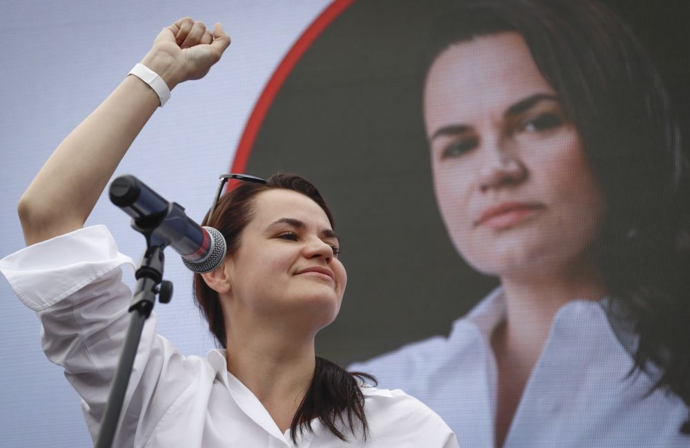 Svetlana Tikhanovskaya, candidate for the presidential elections, reacts during a meeting with her supporters in Minsk, Belarus, Sunday, July 19, 2020.  The presidential election in Belarus is scheduled for August 9, 2020. (AP Photo/Sergei Grits)