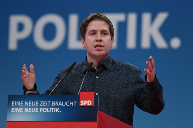 epa06460581 Kevin Kuehnert, chairman of the youth organization of the Social Democratic Party (SPD), the 'Young Socialists', (Junge Sosialisten, or Jusos), delivers his speech during the extraordinary federal party convention of the German Social Democratic Party (SPD) in Bonn, Germany, 21 January 2018. Some 600 delegates and 45 board members of the SPD will discuss and decide whether or not to start coalition negotiations with the conservative Christian Democratic Union (CDU) and Christian Social Union (CSU) parties to form another so-called 'Grand Coalition' (Grosse Koalition, or GroKo) government on the basis of the recent on the basis of the exploratory talks. It is expected that SPD leader Martin Schulz will face some criticism from the party's basis and demands to amend the SPD's catalogue of requirements.  EPA/SASCHA STEINBACH