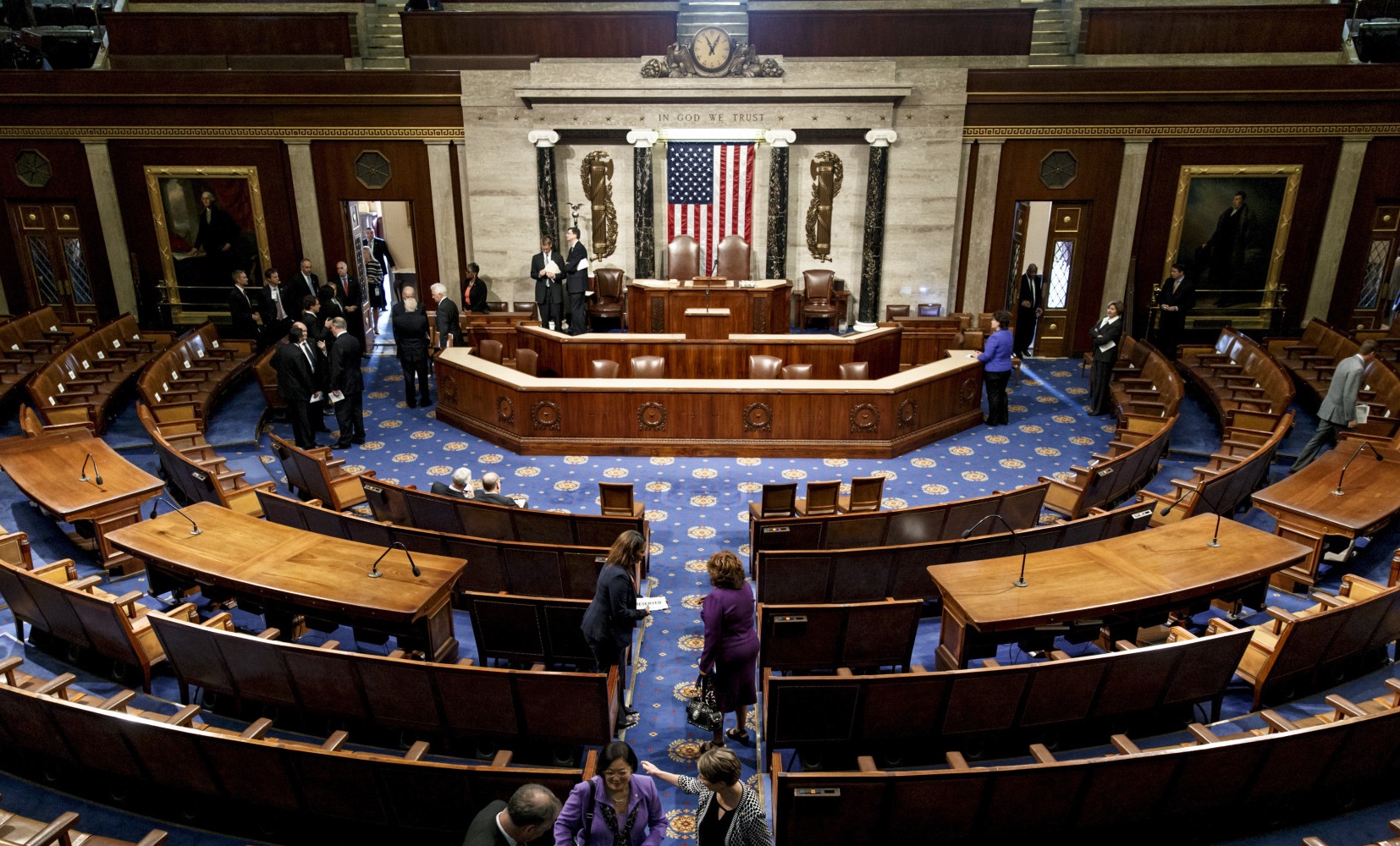 The chamber of the House of Representatives empties following a joint meeting of Congress, at the Capitol in Washington, Thursday, Sept. 18, 2014, with visiting Ukranian President Petro Poroshenko. The House and Senate are wrapping up business and heading to their home states for the weeks leading up to the midterm elections. (AP Photo/J. Scott Applewhite)