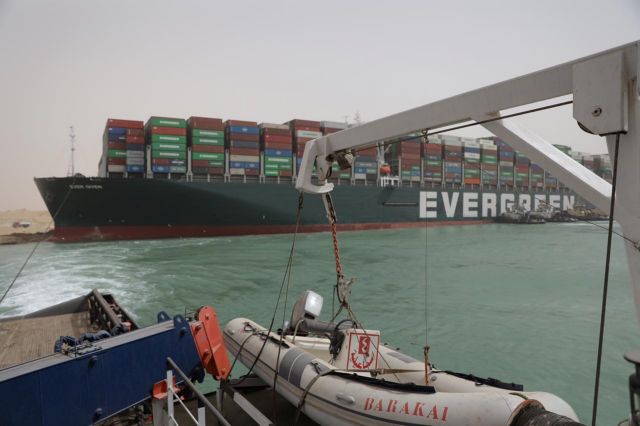 Stranded container ship Ever Given, one of the world's largest container ships, is seen after it ran aground, in Suez Canal, Egypt March 25, 2021. Suez Canal Authority/Handout via REUTERS ATTENTION EDITORS - THIS IMAGE WAS PROVIDED BY A THIRD PARTY. NO RESALES. NO ARCHIVES