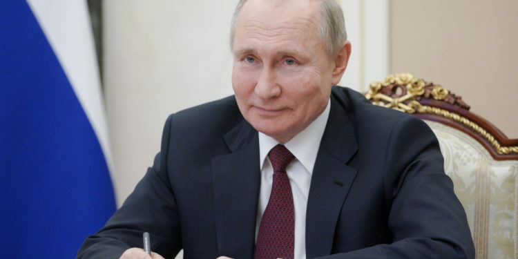 Russian President Vladimir Putin takes part in a video conference in Moscow