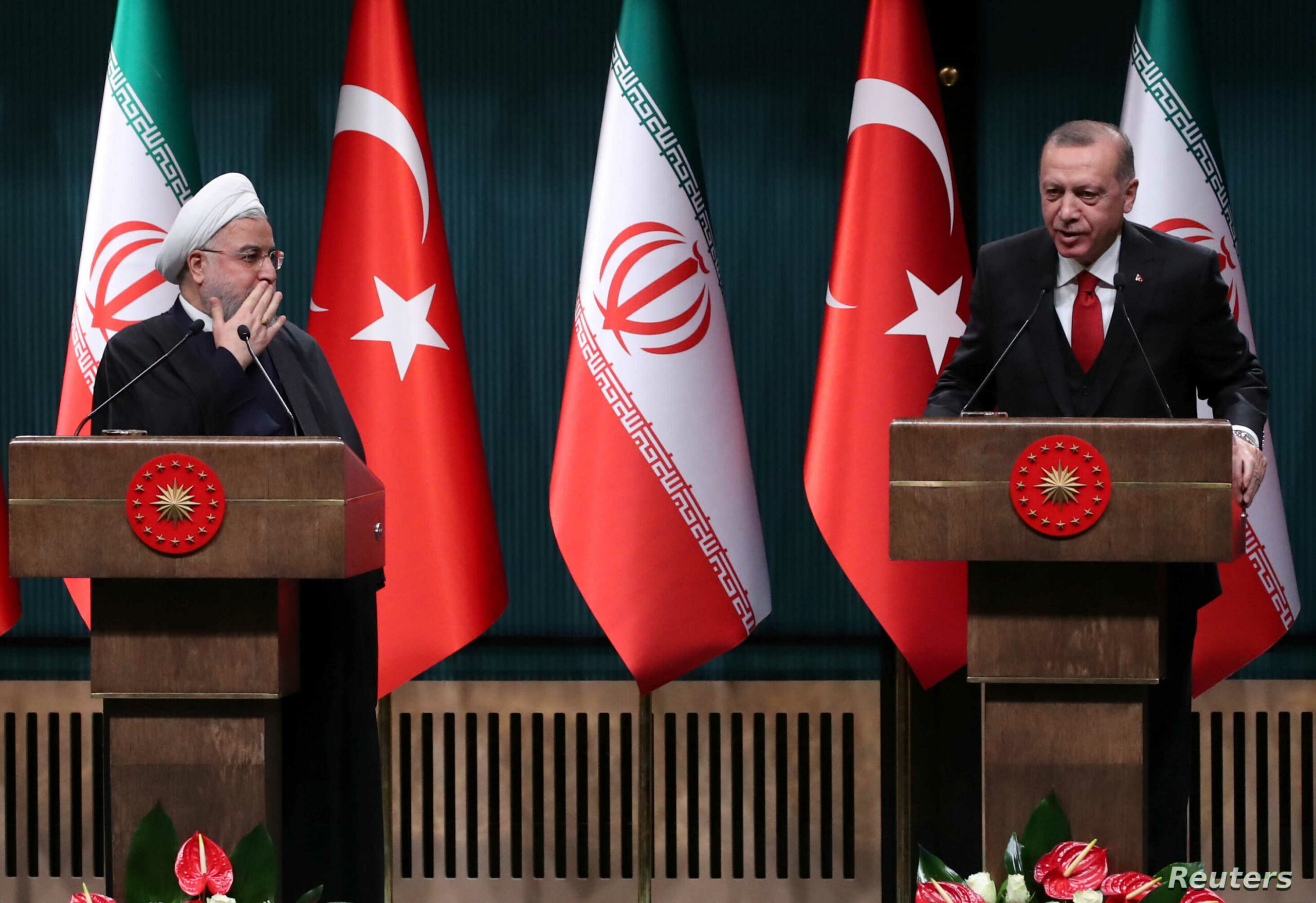 Turkish President Tayyip Erdogan and his Iranian counterpart Hassan Rouhani hold a joint news conference after their meeting in Ankara, Turkey, December 20, 2018. REUTERS/Umit Bektas - RC1D04743FA0
