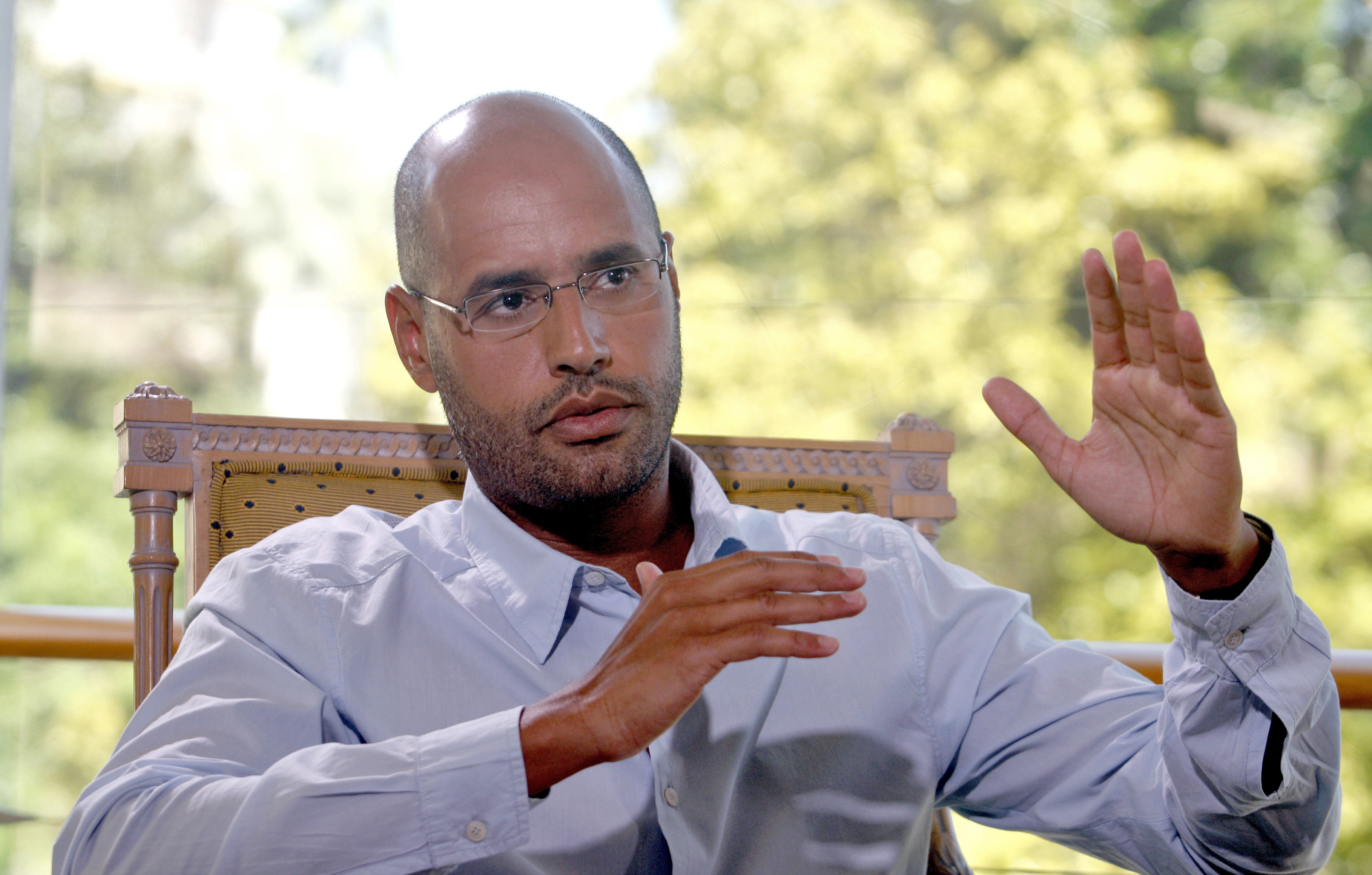 Saif al-Islam, son of Libyan leader Muammar Gaddafi, indicates that Libya plans an enhanced oil recovery round to develop its production capacity during an interview with Reuters in Nice July 30, 2007. Libya has held three oil exploration licensing rounds since the end of Western sanctions against the government in 2004, awarding permits to firms in what is considered one of the world's last under-explored oil-promising regions.   REUTERS/Gilbert Tourte   (FRANCE) - RTR1SDZB