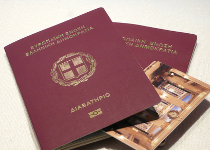 Greek passports, travel documents and a hotel's key