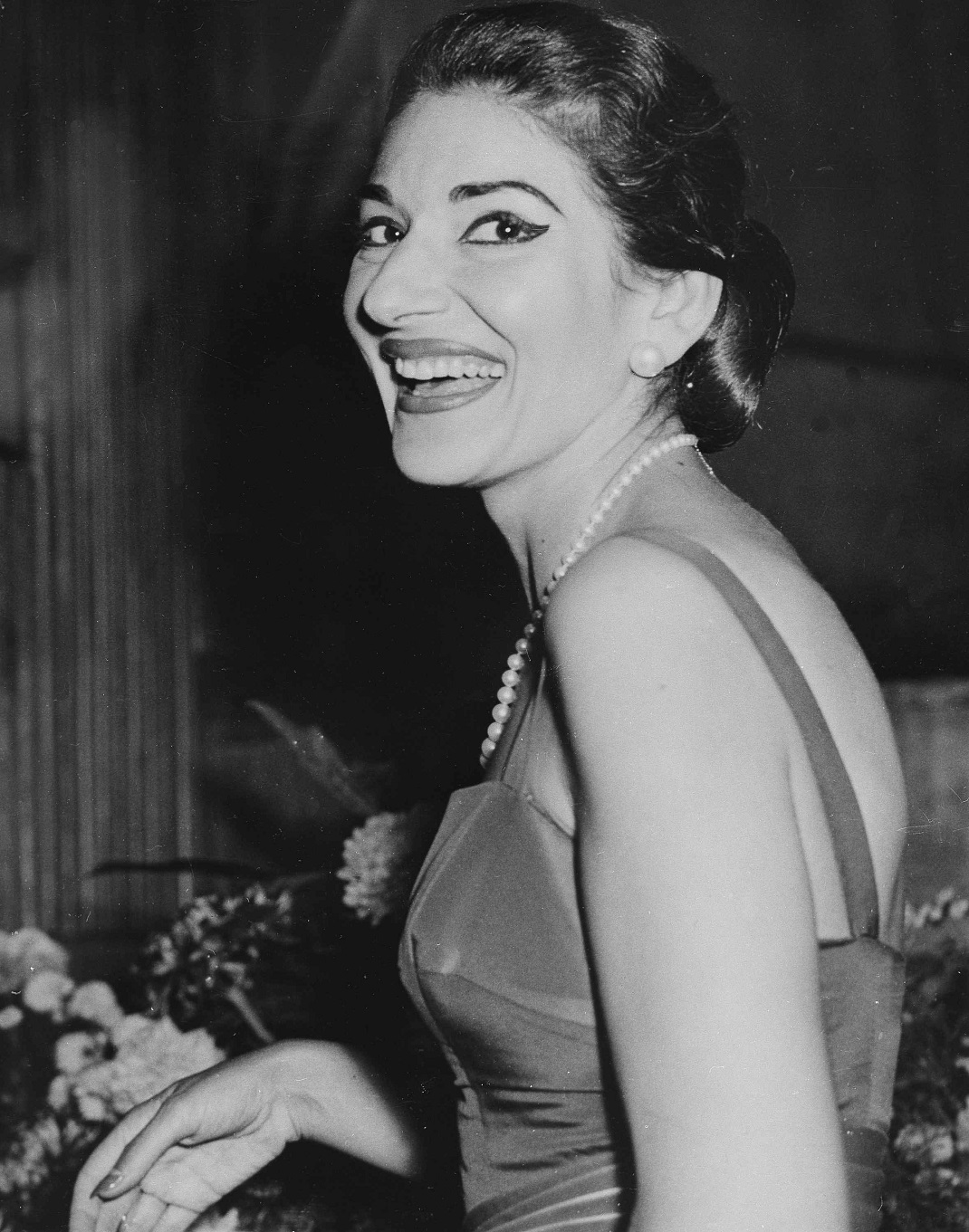Famed Prima Donna Maria Meneghini Callas is in a happy mood during the intermission of her recital at Royal Festival Hall in London, Sept. 23, 1959. (AP Photo/Bob Dear)