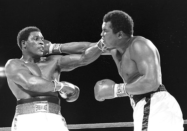 FILE - In this Dec. 12, 1981, file photo, Trevor Berbick, left, and Muhammad Ali seem to have an equal reach as they slug it out during a heavyweight boxing match on Dec. 12, 1981 in Nassau, Bahamas.  Ali turns 70 on Jan. 17, 2012. (AP Photo/File)