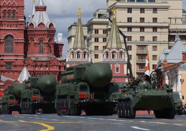 A Russian BTR-82A armoured personnel carrier and Yars intercontinental ballistic missile systems drive in Red Square during a parade on Victory Day, which marks the 77th anniversary of the victory over Nazi Germany in World War Two, in central Moscow, Russia May 9, 2022. REUTERS/Evgenia Novozhenina