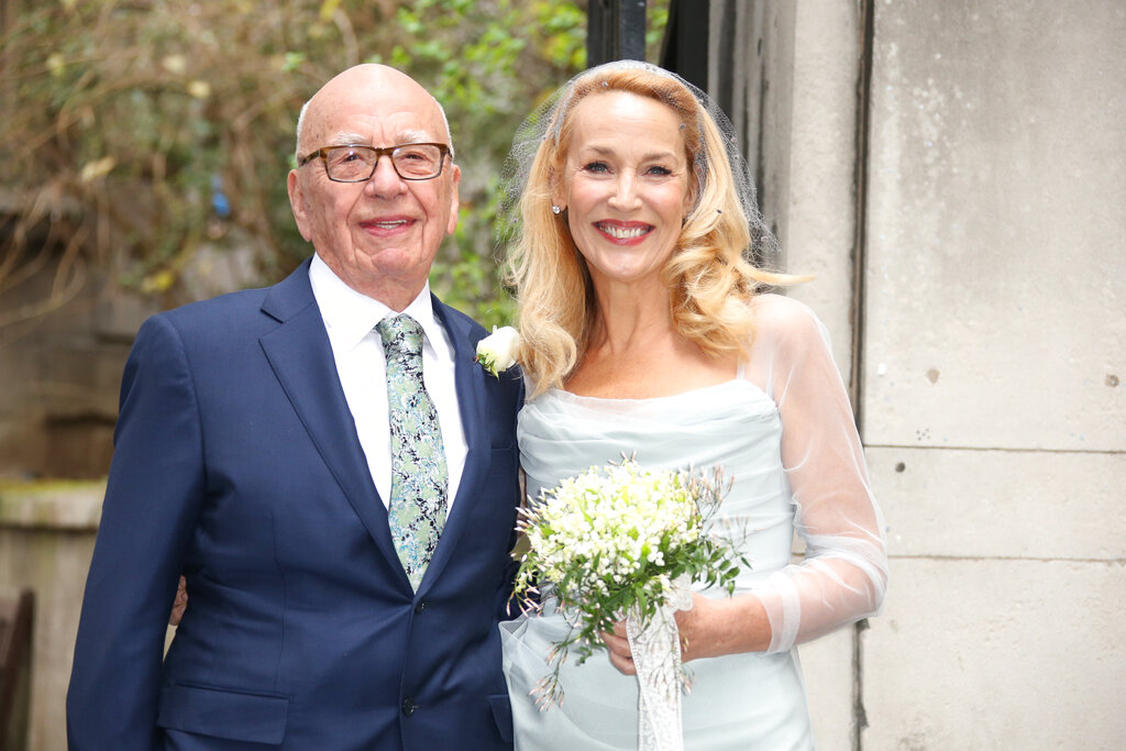 Rupert Murdoch, left, and Jerry Hall leave St Bride's Church after the celebration ceremony of the wedding of Rupert Murdoch and Jerry Hall in London, Saturday, March 5, 2016. (Photo by Joel Ryan/Invision/AP)