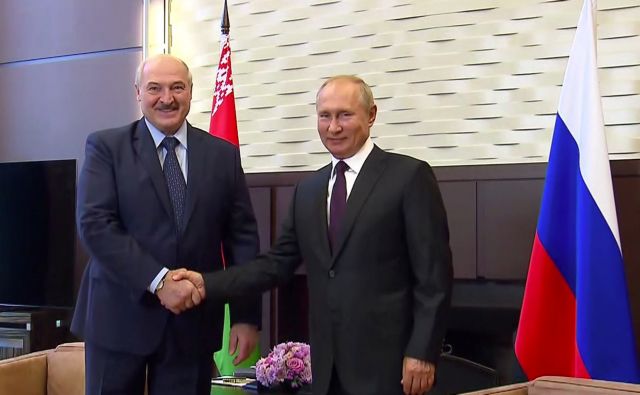 Russia's President Vladimir Putin shakes hands with his Belarusian counterpart Alexander Lukashenko during a meeting in Sochi, Russia September 14, 2020, in this still image taken from a video. Russian Presidential Executive Office/Handout via REUTERS  ATTENTION EDITORS - THIS IMAGE WAS PROVIDED BY A THIRD PARTY. NO RESALES. NO ARCHIVES.