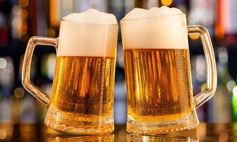 bigstock-Jugs-of-beer-placed-on-bar-cou-921642261