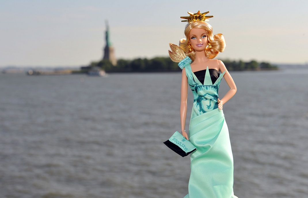 Barbie Collector celebrates the 30th anniversary of their Dolls of the World Collection with the debut of the Statue of Liberty Barbie Doll, part of the new Landmark Collection, Tuesday, June 15, 2010, on Ellis Island in New York.  In addition to the new doll collection, the first ever exhibit of Barbie dolls will be on display at Ellis Island from June 16 through August 15, 2010, representing 40 nations from around the world. (Diane Bondareff/AP Images for Mattel)