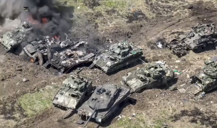 epa10683896 A handout still image taken from a handout video provided by the Russian Defence Ministry’s press service on 10 June 2023 shows German ‘Leopard-2A6’ and American BMP M2 ‘Bradley’ tanks destroyed in combat in the Zaporizhzhia region, southern Ukraine. The Russian Defense Ministry said the Russian military destroyed two columns of armored vehicles of the Armed Forces of Ukraine in the Zaporizhzhia region, including nine tanks, four of which were Leopard.  EPA/RUSSIAN DEFENCE MINISTRY PRESS SERVICE/HANDOUT HANDOUT EDITORIAL USE ONLY/NO SALES HANDOUT EDITORIAL USE ONLY/NO SALES