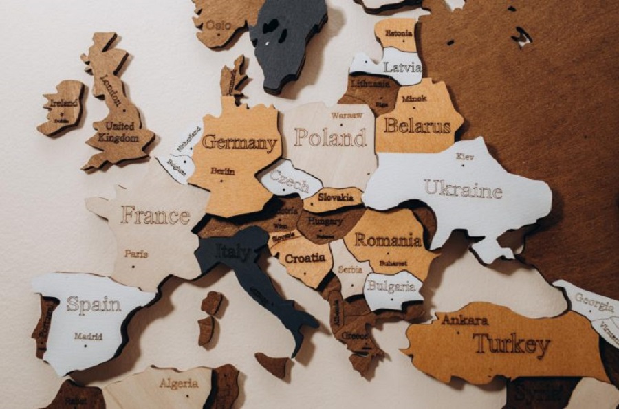 selective-focus-wooden-world-map-thr-wall-geography-concept-background-travel-logistics-jpg