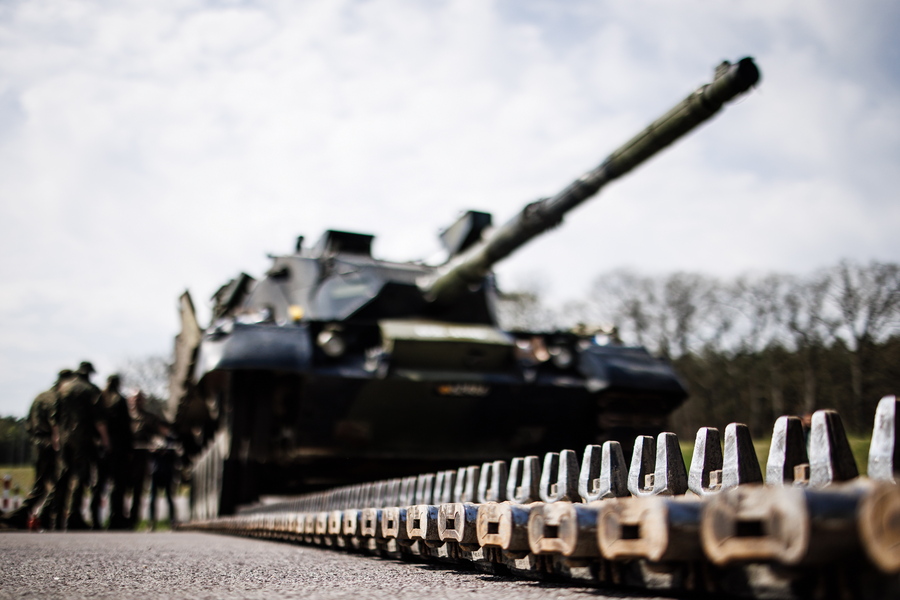 The chain of a tank rests loosened on the ground as Ukrainian soldiers train under the supervision of German and Danish instructors prior to a visit of the German and Danish Defense Ministers at the Federal Armed Forces (Bundeswehr) training hub in Klietz, Germany, 05 May 2023. Together with the Netherlands and Denmark, Germany is financing the refurbishment of Leopard 1A5 battle tanks from industry stocks. Up to 9,000 Ukrainian soldiers will be trained on the system by the end of the year.