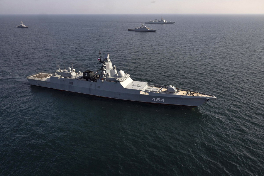 epa10528053 A handout photo made available by Iranian Army shows Admiral Gorshkov class frigate of the Russian Navy Admiral Flota Sovetskogo Soyuza Gorshkov (front) during a joint military drill of Iranian, Russian and Chinese warships in the Gulf of Oman, south of Iran, 17 March 2023. Iran, China and Russia started a joint naval military drills in the Gulf of Oman on 17 March 2023 for two days, according to the Iranian Army.  EPA/IRANIAN ARMY HANDOUT  HANDOUT EDITORIAL USE ONLY/NO SALES