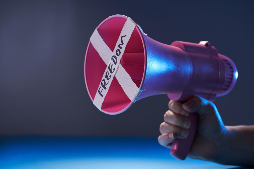 megaphone-with-crossed-tape-free-speak