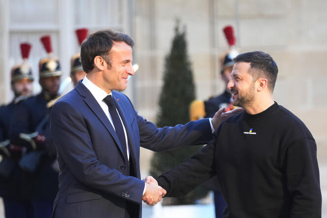 FILE - French President Emmanuel Macron, right, welcomes Ukrainian President Volodymyr Zelenskyy at the Elysee palace in Paris, Sunday, May 14, 2023. European leaders promised Zelenskyy missiles, tanks and drones during a whirlwind three-day visit to Italy, Germany, France and the U.K. that sought to replenish Ukraine’s depleted weapons supplies ahead of a spring offensive aimed at turning the tide of the war. (AP Photo/Michel Euler, File)